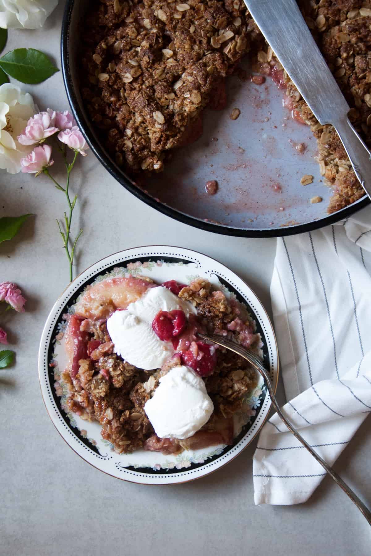 Gluten Free Strawberry Vanilla Crumble, LOW FODMAP friendly + vegan, nut free and naturally sweetened.Perfect quick, economic and nutritious dessert.
