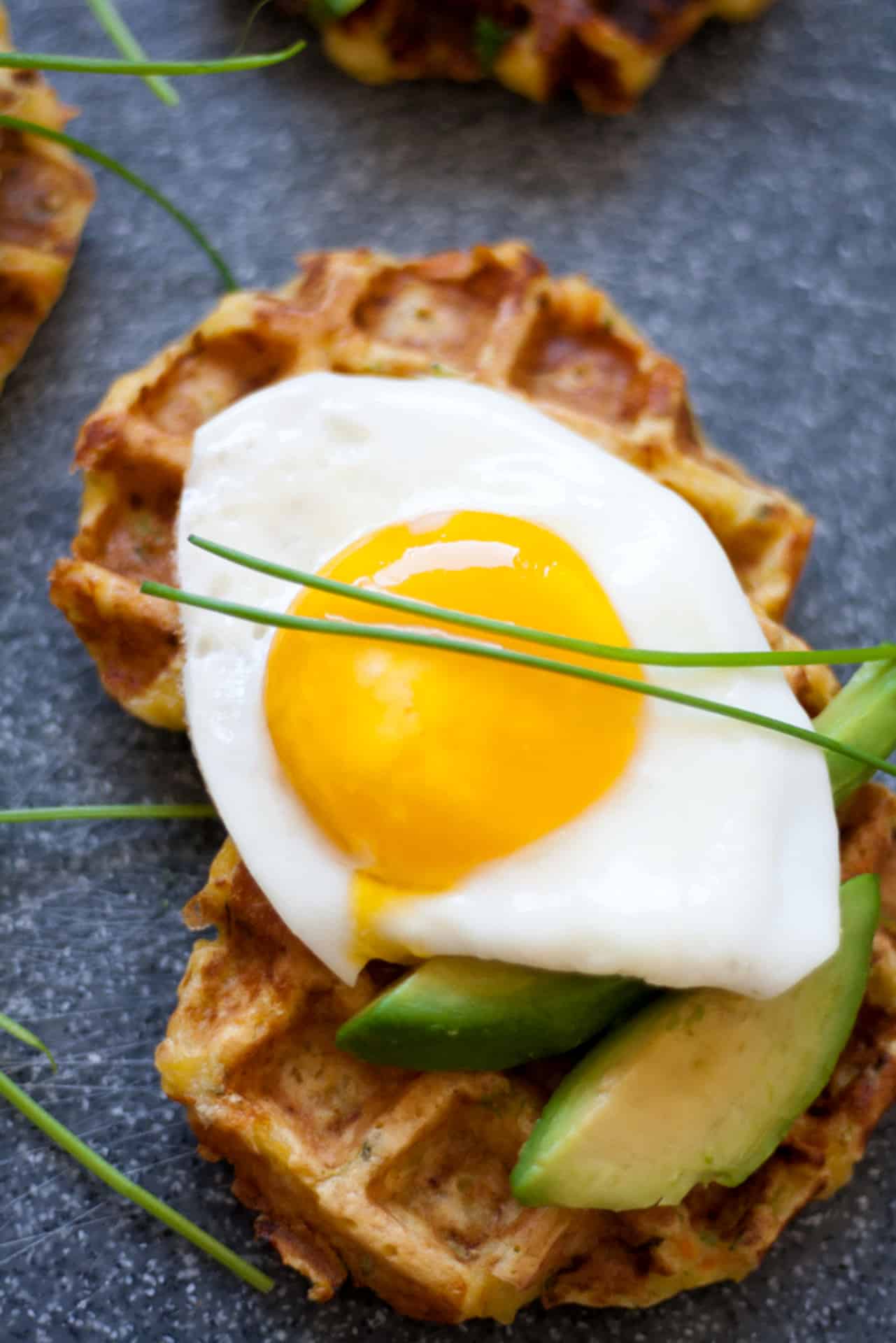 Food photography,Veggie Waffles with avo and egg.