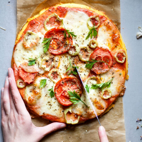 This Polenta Pizza is simple to make, naturally gluten-free and low FODMAP. It is made from 4 simple ingredients and takes only 30min to make.