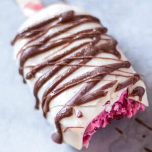 vegan raspberry magnum coated with white chocolate