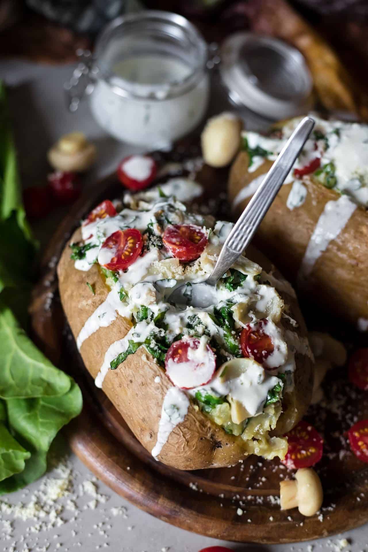 Simple to make, 5 ingredient Low FODMAP Stuffed Baked Potatoes. They are super flavorful, cheesy, creamy, healthy and easy on the stomach. 