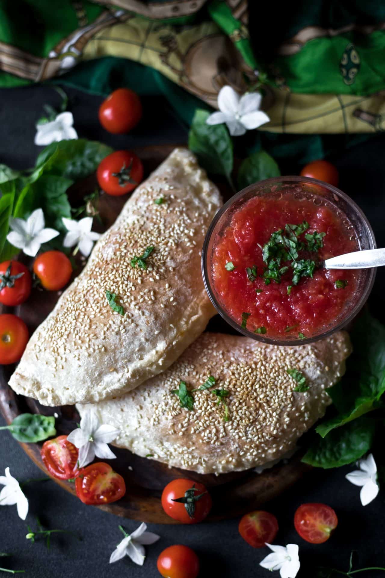 This Gluten-Free Calzone is low FODMAP and easy to digest. It is super flavorful and has a perfect texture crispy on the outside and chewy on the inside.