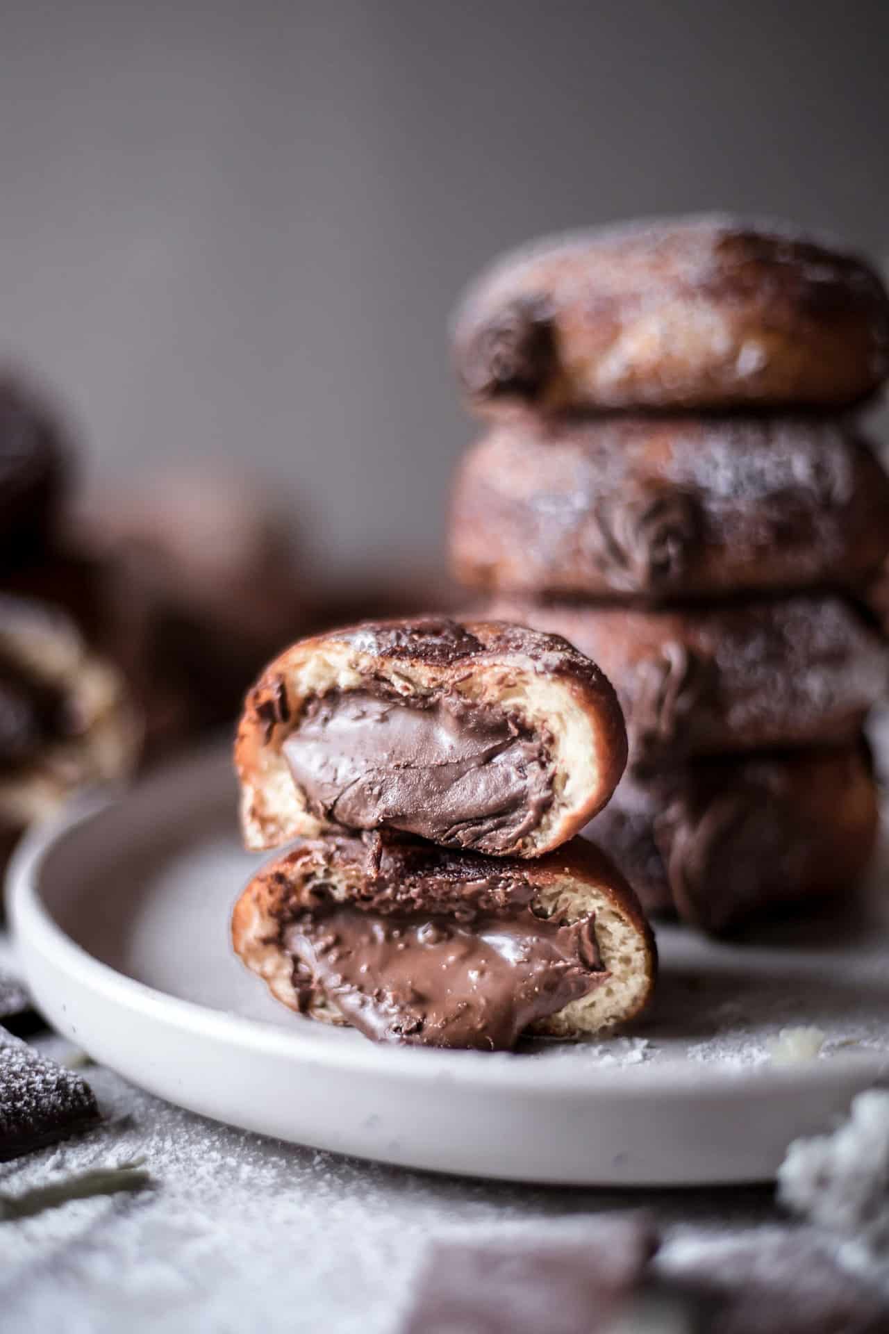 These gluten-free yeast-raised doughnuts are pillowy soft, fluffy, perfectly sweetened and so easy to make! They make a perfect dessert, snack or breakfast.