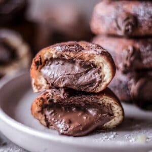 gluten-free donuts stuffed with chocolate cream and cut in half