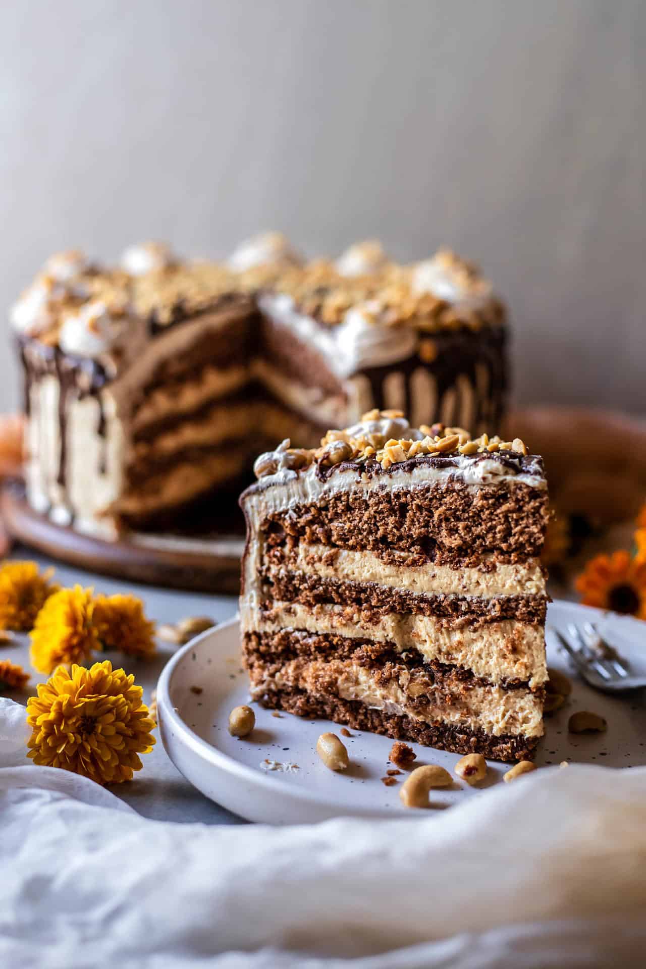 This gluten-free chocolate peanut butter cake is perfectly sweetened, moist, soft, super chocolaty, peanut butter infused, rich, flavorful and so delicious!