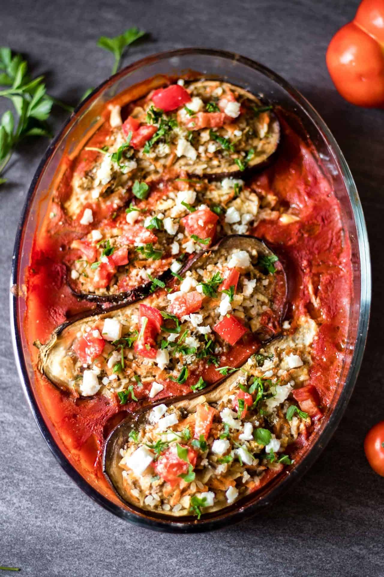 Simple and healthy Low FODMAP Veggie Stuffed Eggplant. Option to make it completely vegan. A flavorful, comforting and super delicious dish.