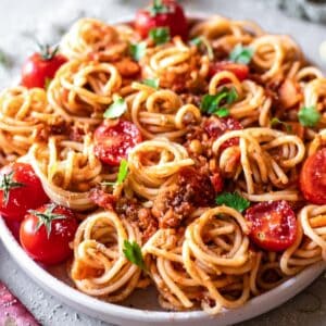 A plate of spaghetti with low FODMAP vegan bolognese