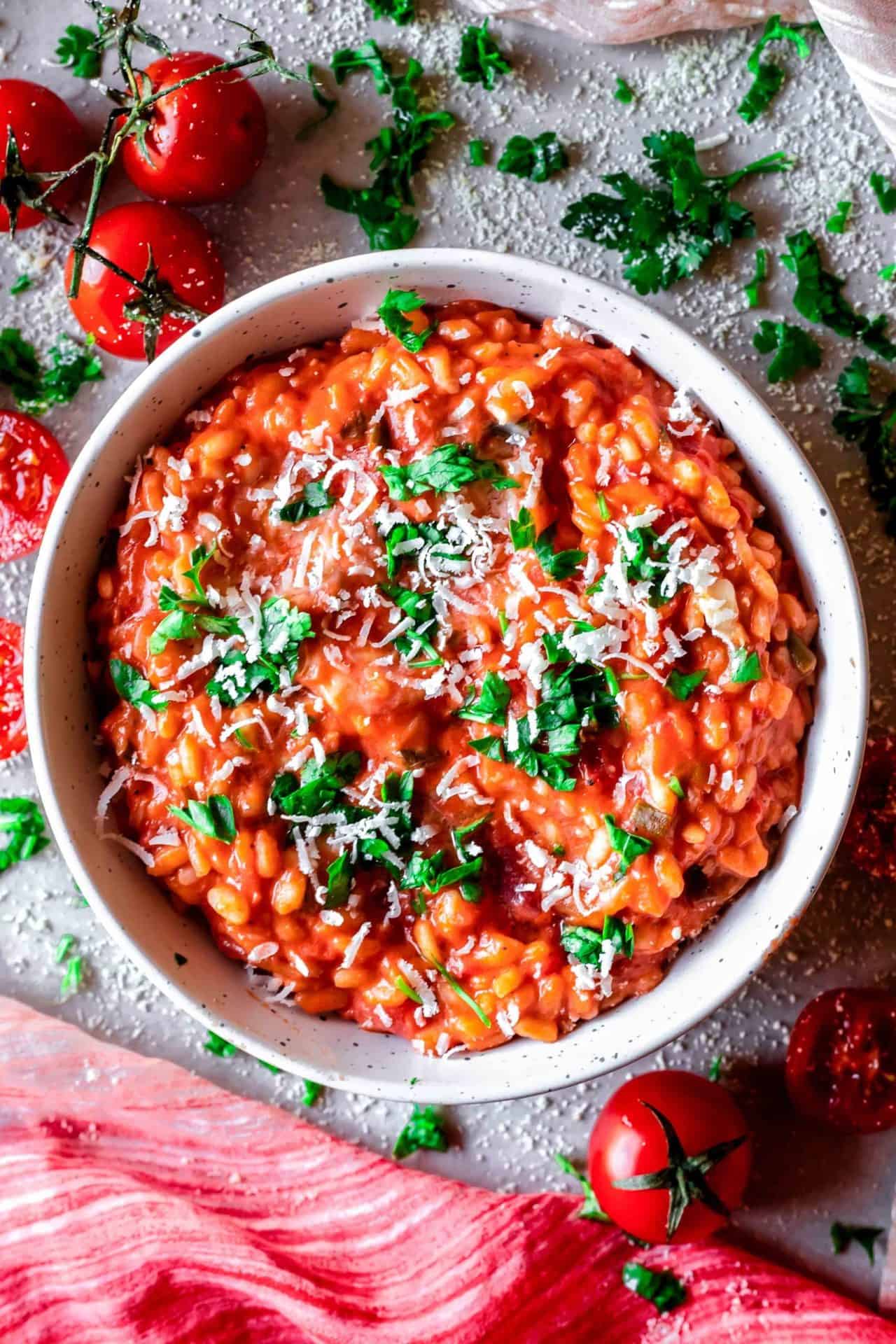 This Low FODMAP Creamy Tomato Risotto is super flavorful, savory, so creamy, simple to make, satisfying and so comforting and delicious! 