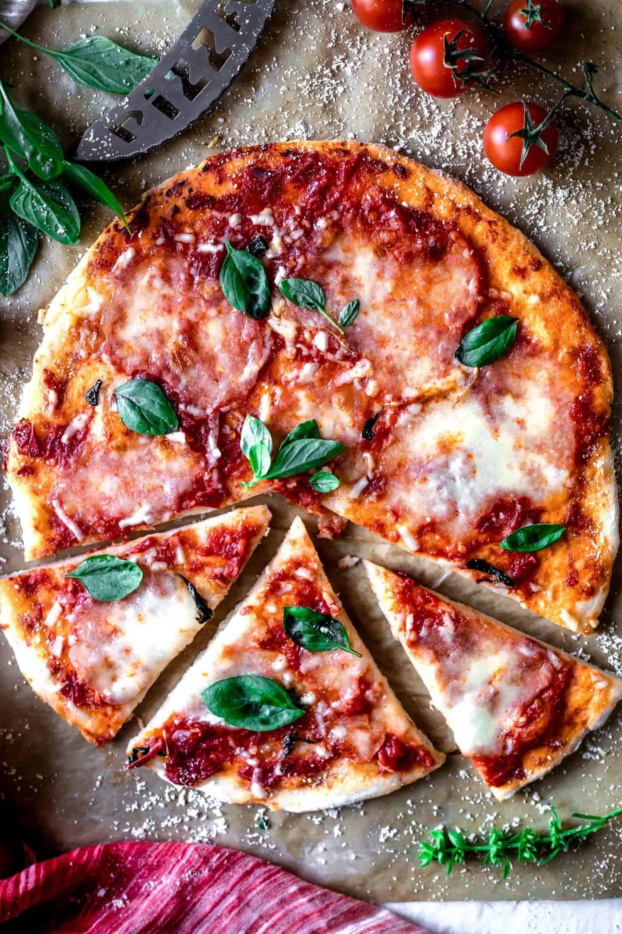 This Gluten-Free Pizza Crust is thin, perfectly crisp on the edges and tender in the center, requires only 7 ingredients and it is so delicious!