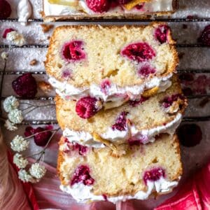 Sliced gluten-free lemon and raspberry loaf cake