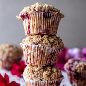 three gluten-free raspberry muffins