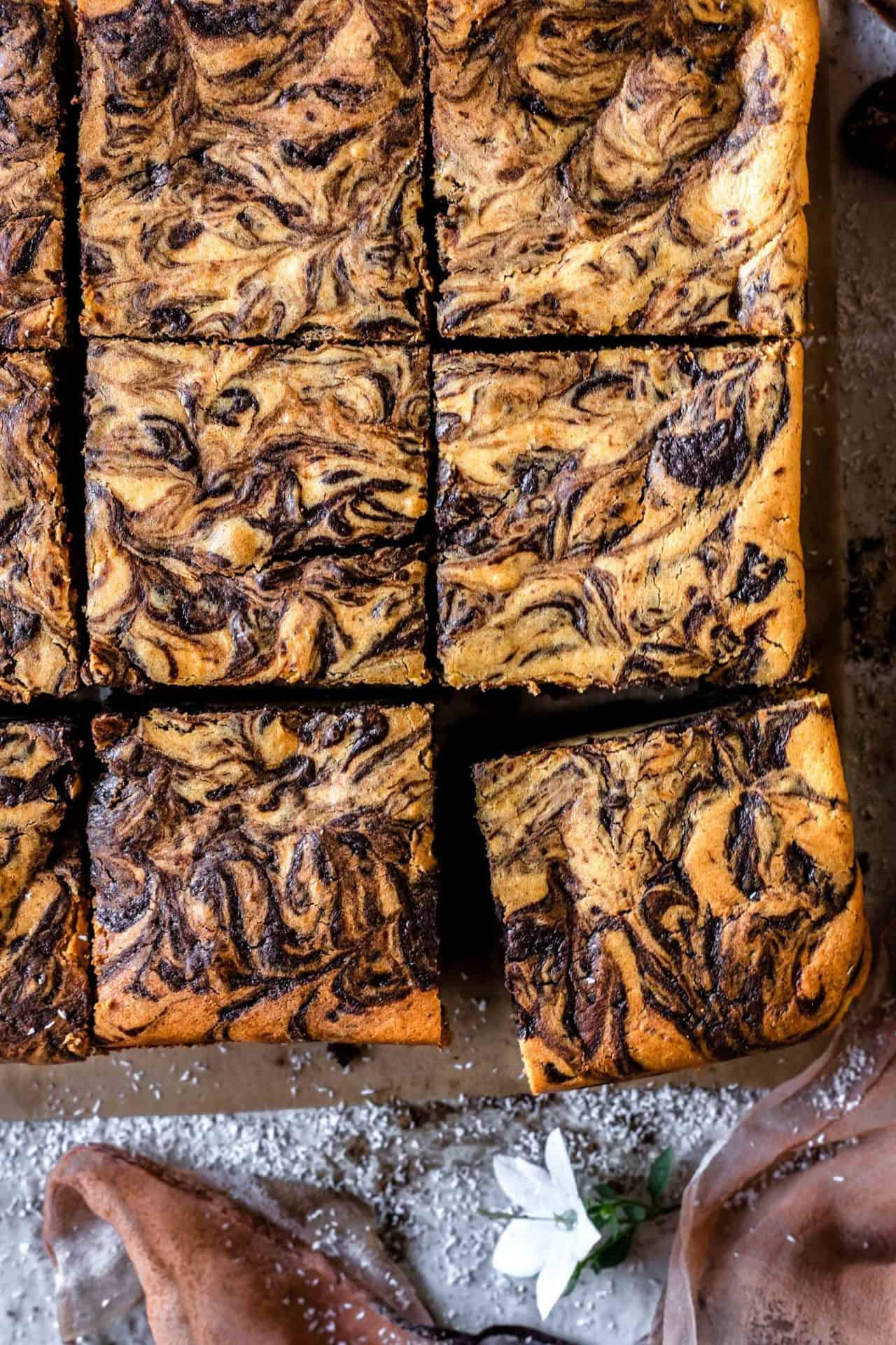 These Gluten-Free Pumpkin Cheesecake Brownies are perfectly sweetened, super chocolaty, pumpkin-infused, gooey, and just so delicious!