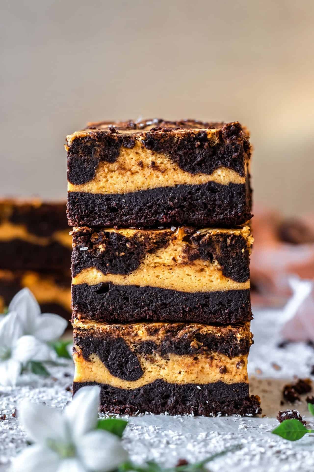 These Gluten-Free Pumpkin Cheesecake Brownies are perfectly sweetened, super chocolaty, pumpkin-infused, gooey, and just so delicious!