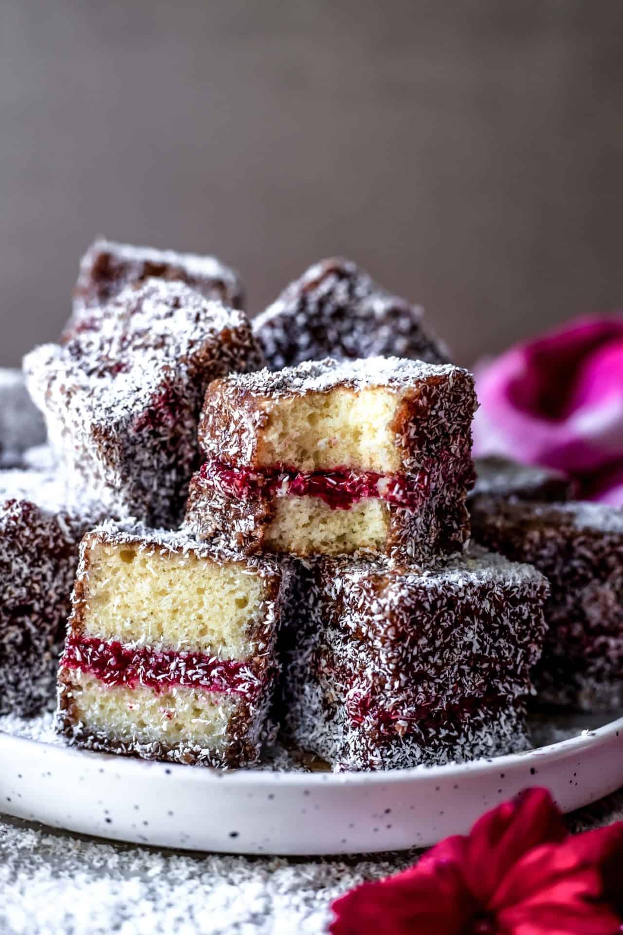 These Gluten-Free Lamingtons are spongy, soft, buttery, jam-infused, flavorful, perfectly sweetened and so delicious!