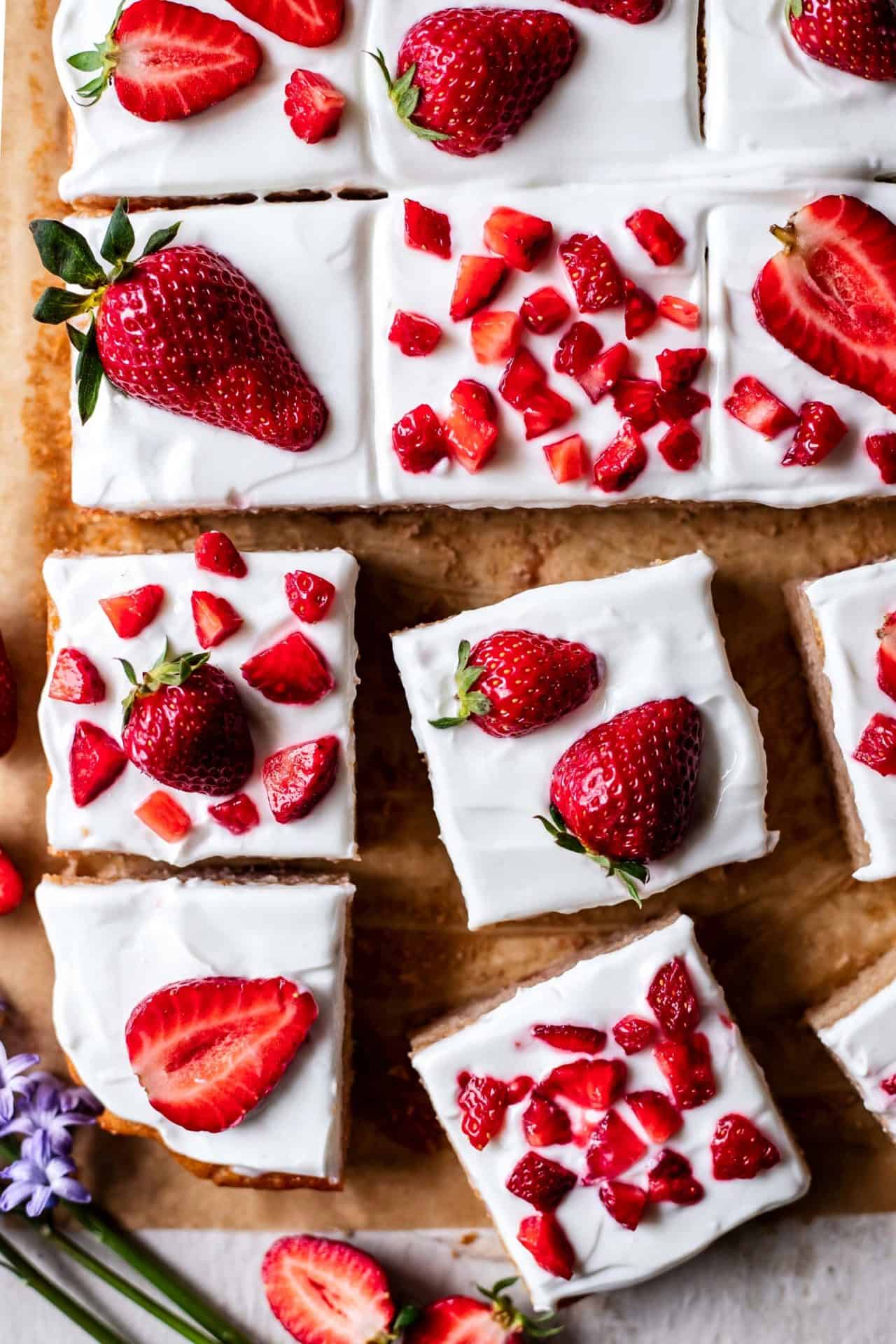 This Gluten-Free Strawberry & Yogurt Sheet Cake is tender, fruity, light, healthy, and incredibly easy to make! Plus it is gluten, dairy and refined sugar free!