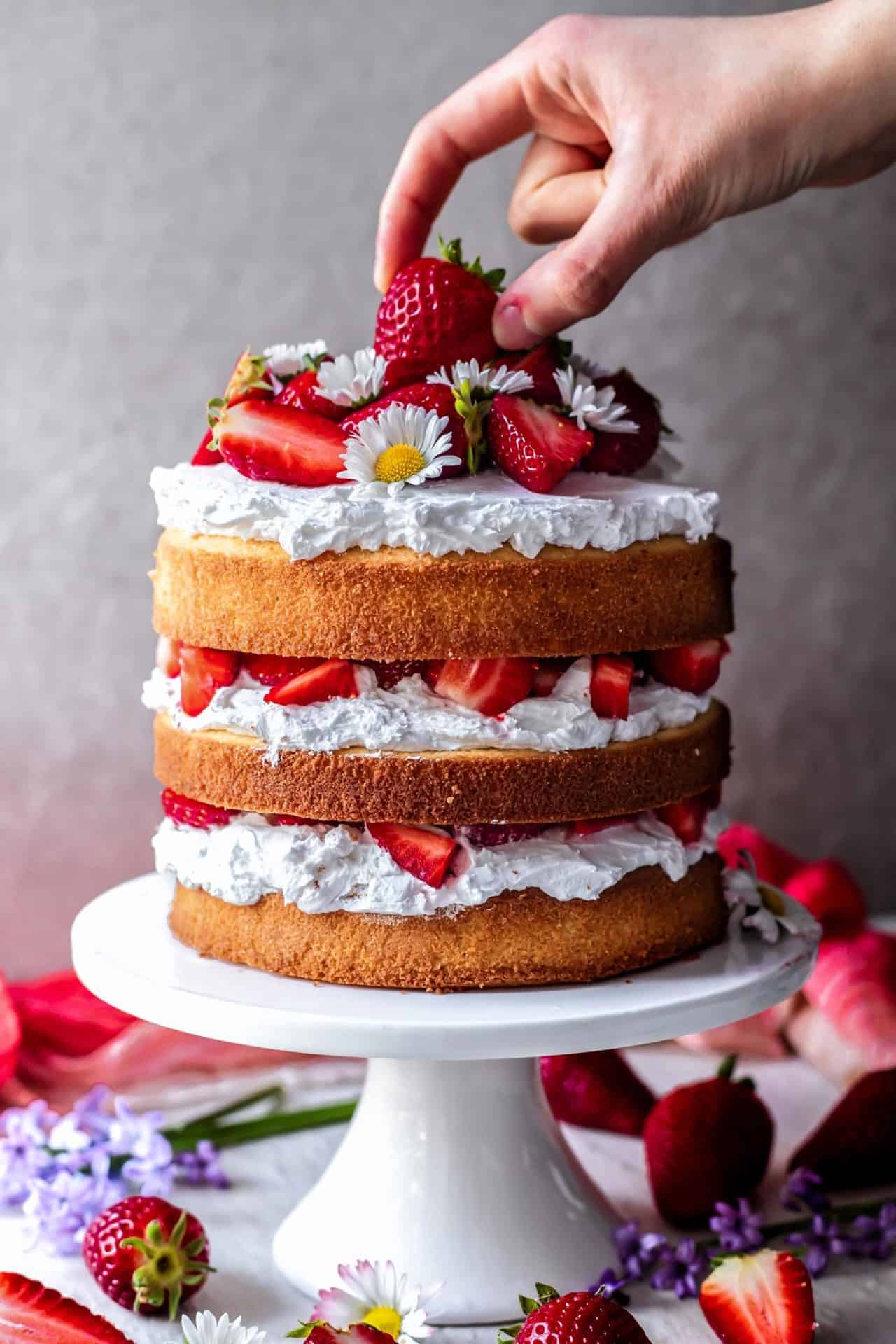 This Gluten-Free Strawberry and Cream Cake is extra fluffy, light, super creamy, incredibly simple to make, flavourful and just so delicious!

