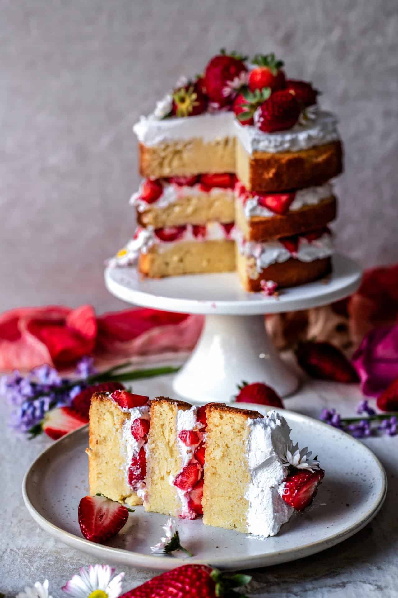 This Gluten-Free Strawberry and Cream Cake is extra fluffy, light, super creamy, incredibly simple to make, flavourful and just so delicious!
