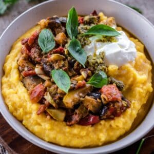 A plate of polenta with veggies