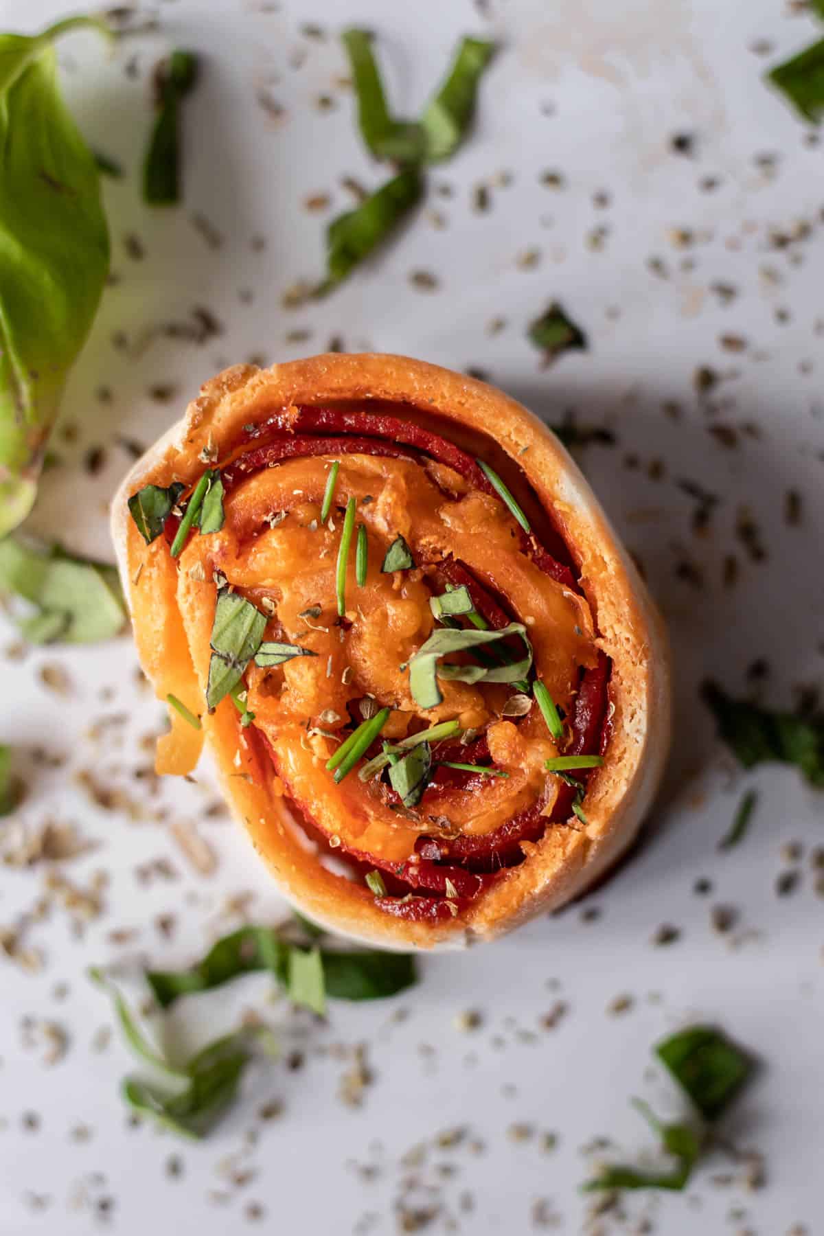 A close up of a gluten-free pizza roll.