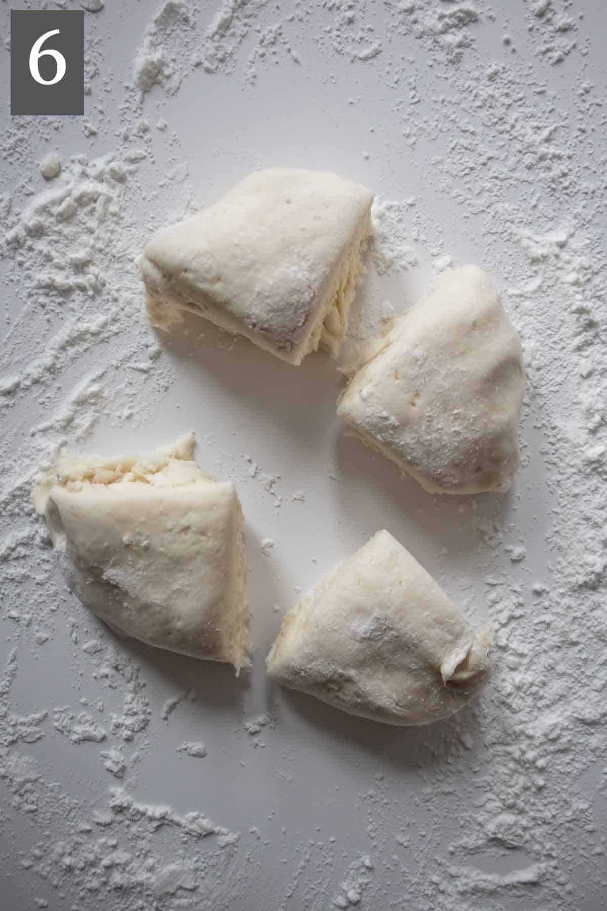 Dough divided in 4 pieces.