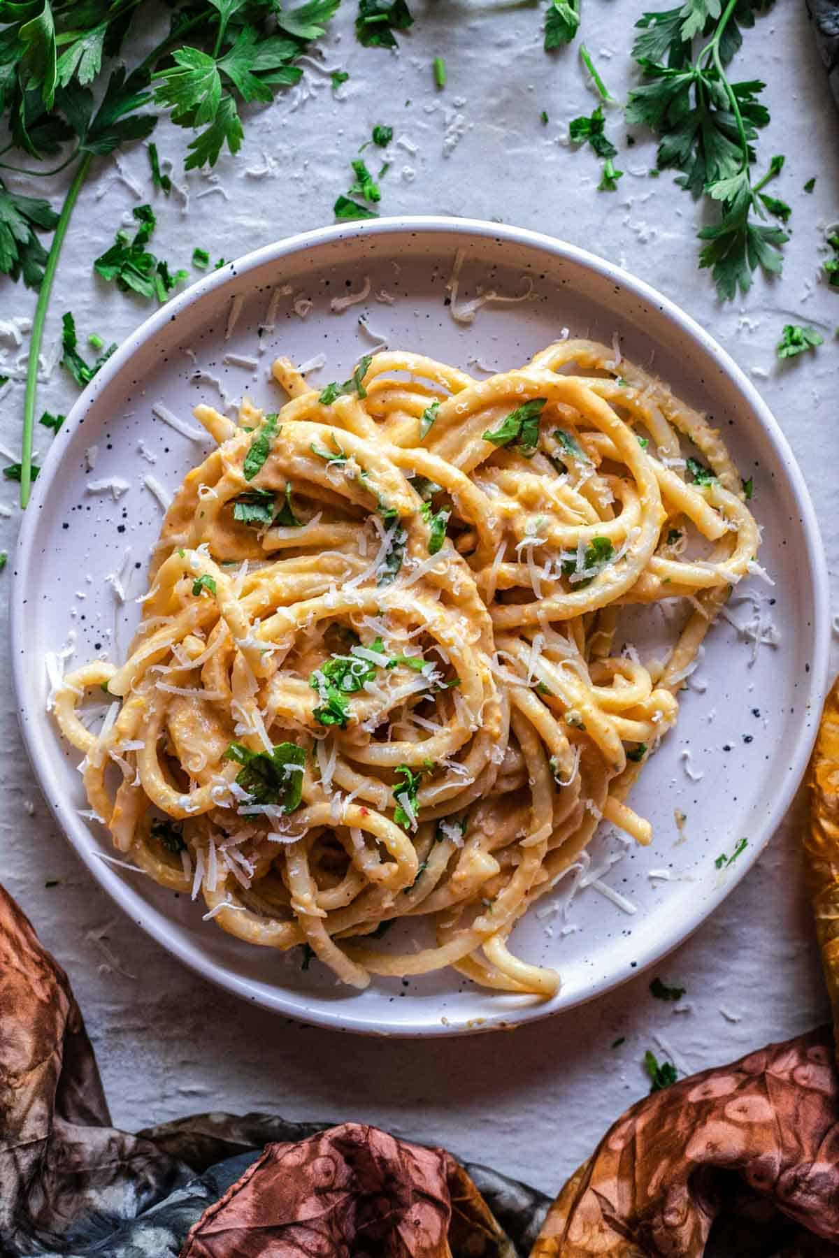 Spaghetti with creamy pumpkin sauce on a plate