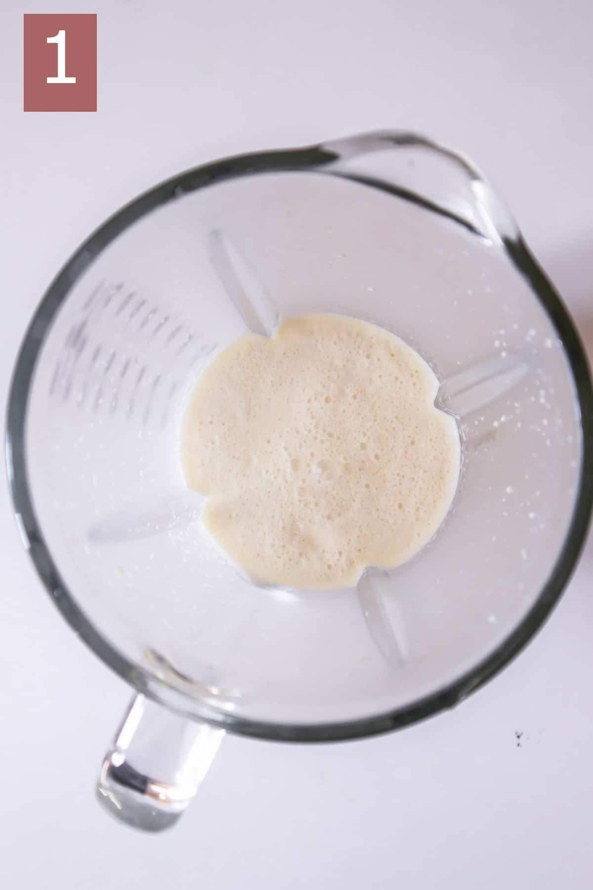 Milk, maple and white chocolate in a blender