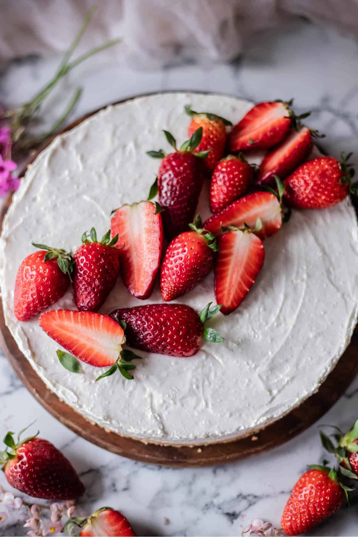 Gluten-free no-bake cheesecake decorated with fresh strawberries