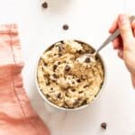 Edible chocolate chip cookie dough in a bowl.