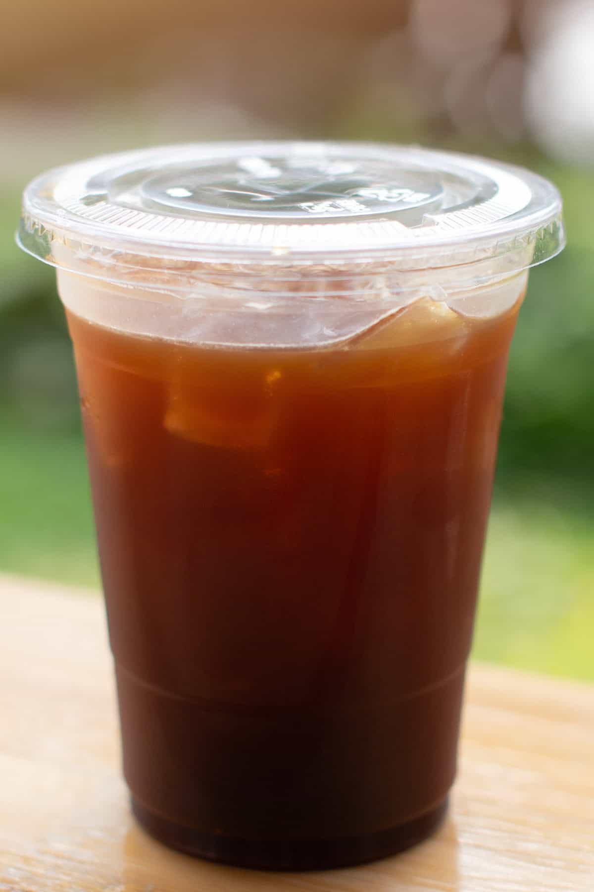 Iced Americano in a plastic cup