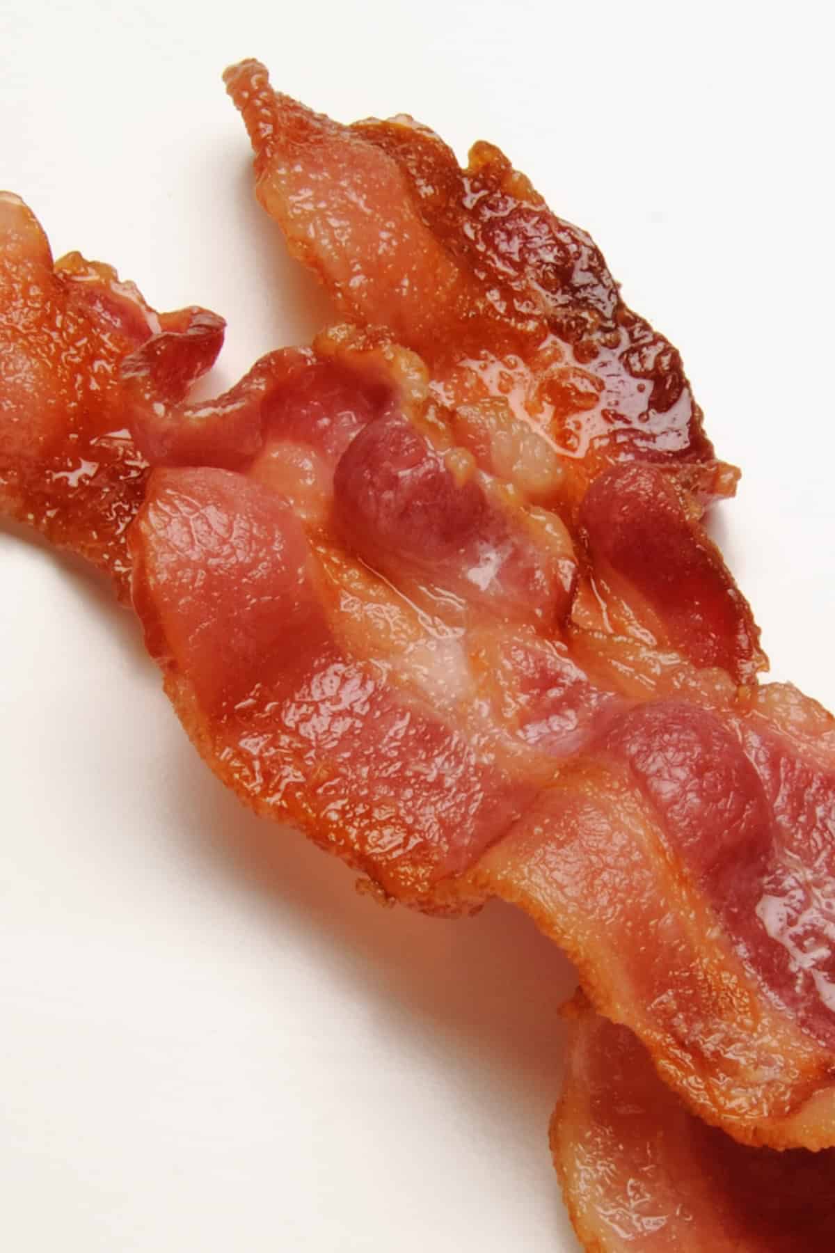 Snackin’ Bacon on a white plate.