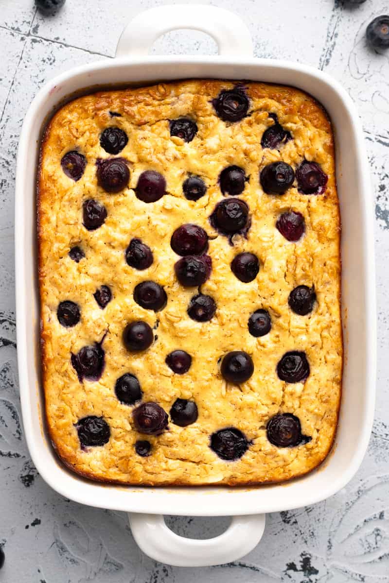 overhead view of Blueberry cottage cheese breakfast bake in a white casserole dish