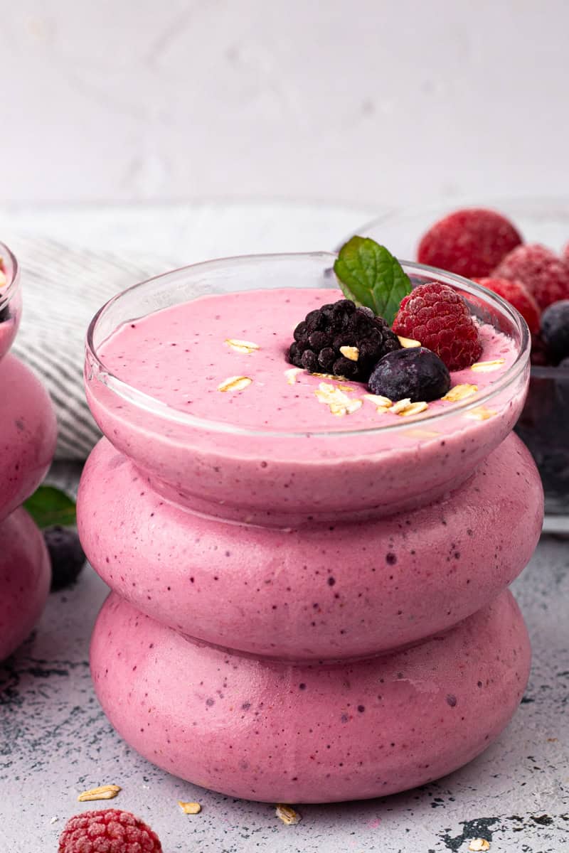 Triple Berry Oat Tropical Smoothie with fresh berries