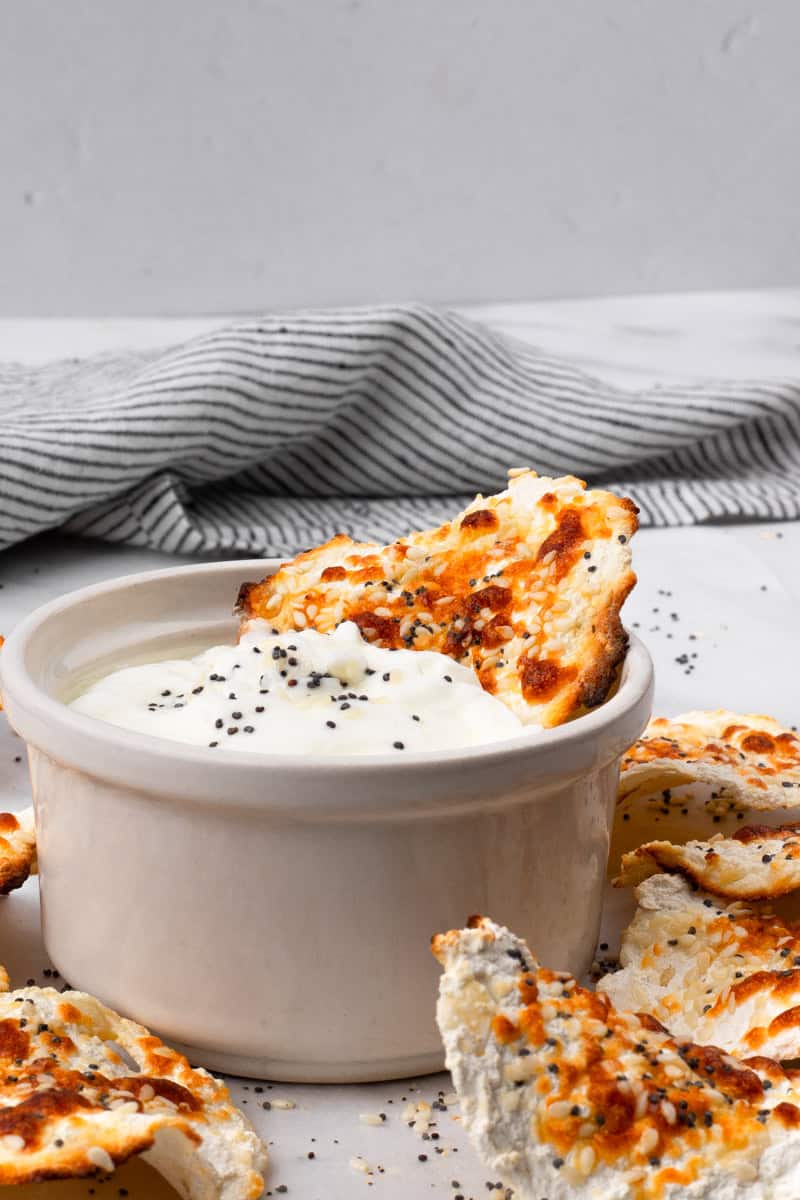 dipping the cottage cheese chips into dip